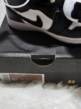 Nike Black and White Kids' High-Top Sneakers with Plush Panda Detail
